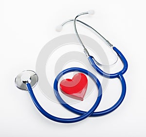 Stethoscope and heart shaped object