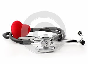 Stethoscope with heart on a white