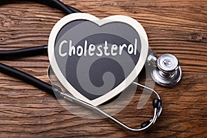 Stethoscope And Heart With Word Cholesterol