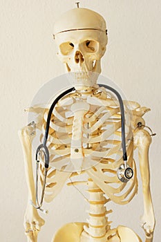 Stethoscope on a human sceleton.