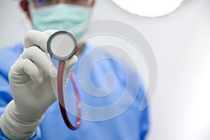 Stethoscope image focus male doctor holding a stethoscope Patient examination tools come to the hospital Medical personnel and