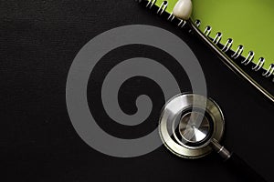Stethoscope isolated on black background. Healthcare/Medical concept