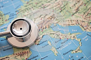 Stethoscope on Italy map background