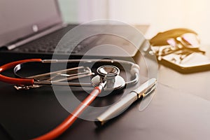 Stethoscope on laptop,Healthcare and medical concept,Selective focus