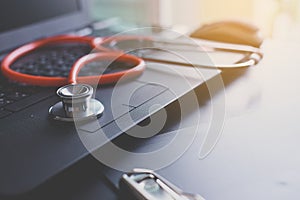 Stethoscope on laptop,Healthcare and medical concept,Selective focus