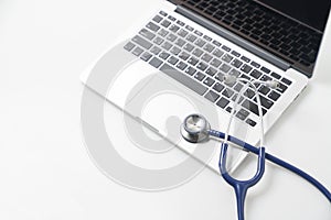 Stethoscope on laptop, Healthcare and medicine or computer antivirus protection and repair maintenance service concept
