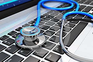 Stethoscope on laptop keyboard