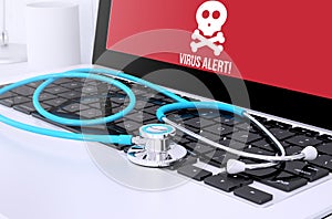 stethoscope on laptop keyboard with screen showing virus alert