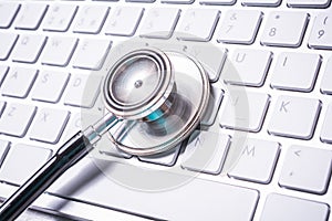 Stethoscope Lying On A Keyboard - Computer Repair Concept