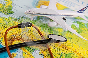 Stethoscope on map medical concept tourism travel care