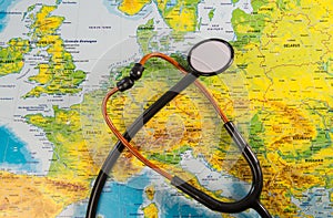 Stethoscope on map medical concept tourism travel care