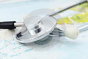 Stethoscope on map medical concept turism travel care diseasea healthy