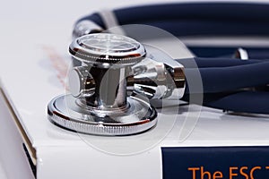 Stethoscope and medical books