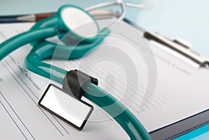 Stethoscope on medical document