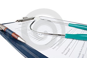 Stethoscope on medical document