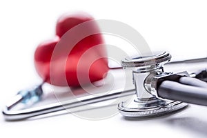 Stethoscope. Medical tool stethoscop with pills and red heart photo