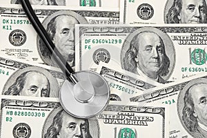 Stethoscope on money background