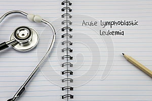 Stethoscope on notebook and pencil with Acute lymphoblastic leuk photo