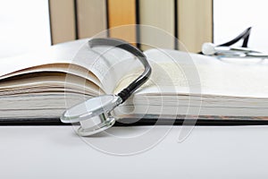Stethoscope on open book