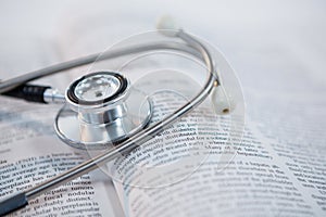 Stethoscope on open book