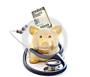 Stethoscope, piggy bank and banknotes 2