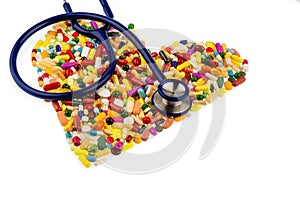Stethoscope and pills in heart shape