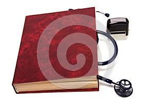 Stethoscope on red book