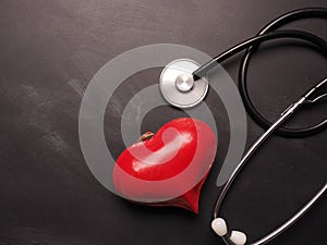 Stethoscope with red heart shape