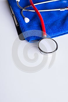 Stethoscope red on table,Healthcare and medical concept