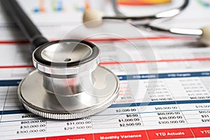 Stethoscope on spreadsheet and graph paper, Finance, Account, Statistics, Investment, Analytic research data economy and Business