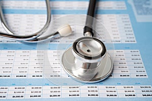 Stethoscope on spreadsheet paper, Finance, Account, Statistics, Investment, Analytic research data economy and Business company