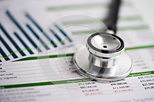 Stethoscope on spreadsheet paper, Finance, Account, Statistics, Investment, Analytic research data economy spreadsheet