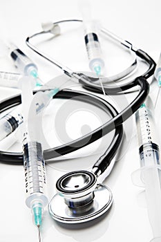 Stethoscope and syringes