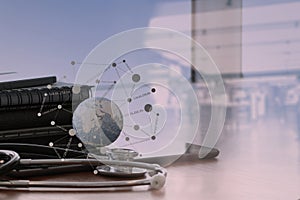 Stethoscope and texture globe with digital tablet