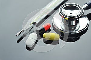 Stethoscope, Thermometer and Medication