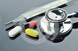 Stethoscope, Thermometer and Medication