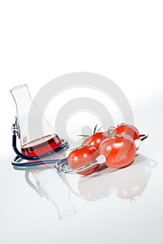 Stethoscope with tomatoes , analytical