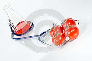 Stethoscope with tomatoes , analytical