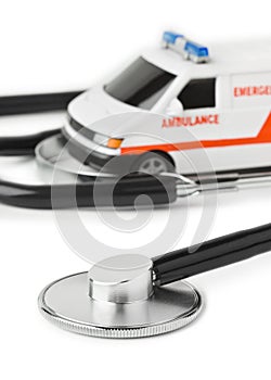 Stethoscope and toy ambulance car