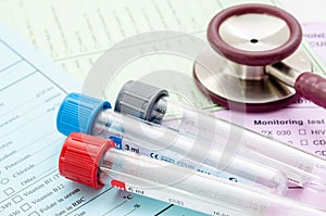 Stethoscope tube of blood and medical check list