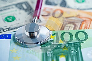 Stethoscope on US dollar and EURO banknotes, Finance, Account, Statistics, Analytic research data and Business company  medical