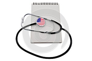 Stethoscope with USA flag head and blank notepad