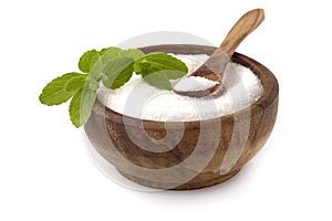 Stevia rebaudiana, sweet leaf sugar substitute isolated in wooden bowl on white background