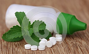 Stevia with sweetening tablets and bottle