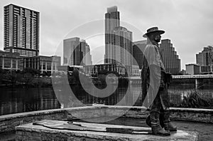 Stevie Ray Statue Austin Skyline Background