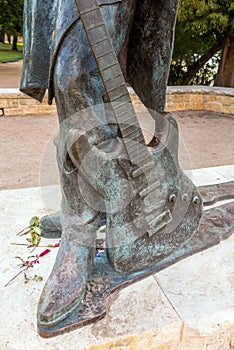 Stevie Ray Vaughan statue in front of downtown Austin and the Co photo