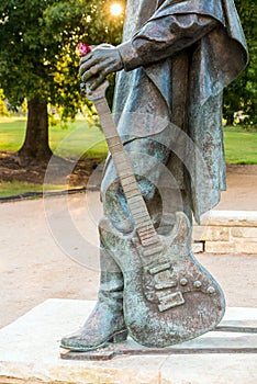 Stevie Ray Vaughan statue in front of downtown Austin and the Co photo