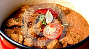 Stew - beef goulash in rustic pot-cruise