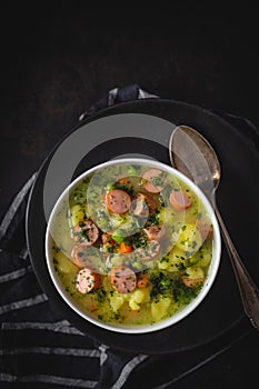 Stew with fresh vegetables and sausages