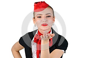 Stewardess blowing a kiss